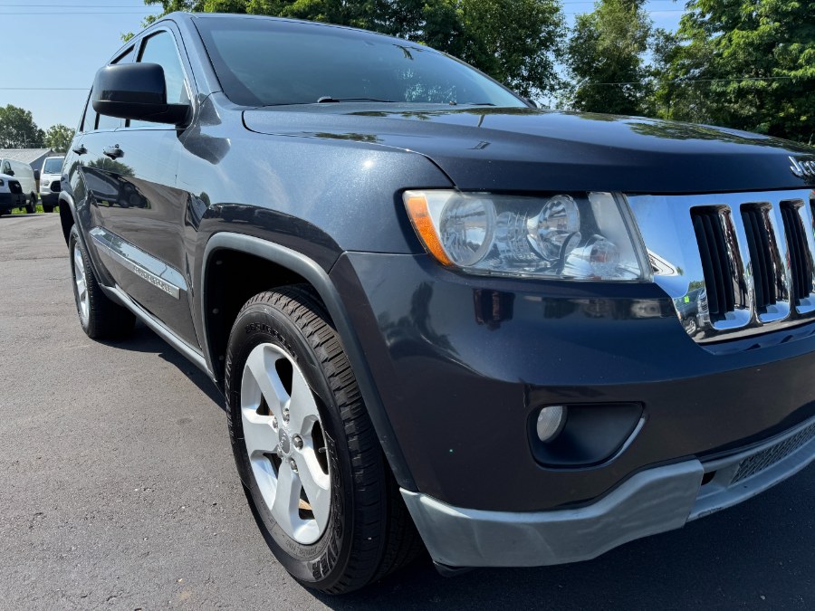 2012 Jeep Grand Cherokee 4WD 4dr Laredo Altitude, available for sale in Ortonville, Michigan | Marsh Auto Sales LLC. Ortonville, Michigan 2012 Jeep Grand Cherokee 4WD 4dr Laredo Altitude, available for sale in Ortonville, Michigan | Marsh Auto Sales LLC. Ortonville, Michigan