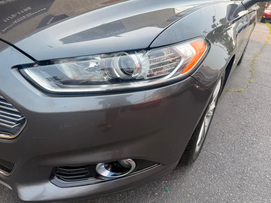 2015 Ford Fusion 4dr Sdn Titanium Hybrid FWD, available for sale in Revere, Massachusetts | Wonderland Auto. Revere, Massachusetts 2015 Ford Fusion 4dr Sdn Titanium Hybrid FWD, available for sale in Revere, Massachusetts | Wonderland Auto. Revere, Massachusetts