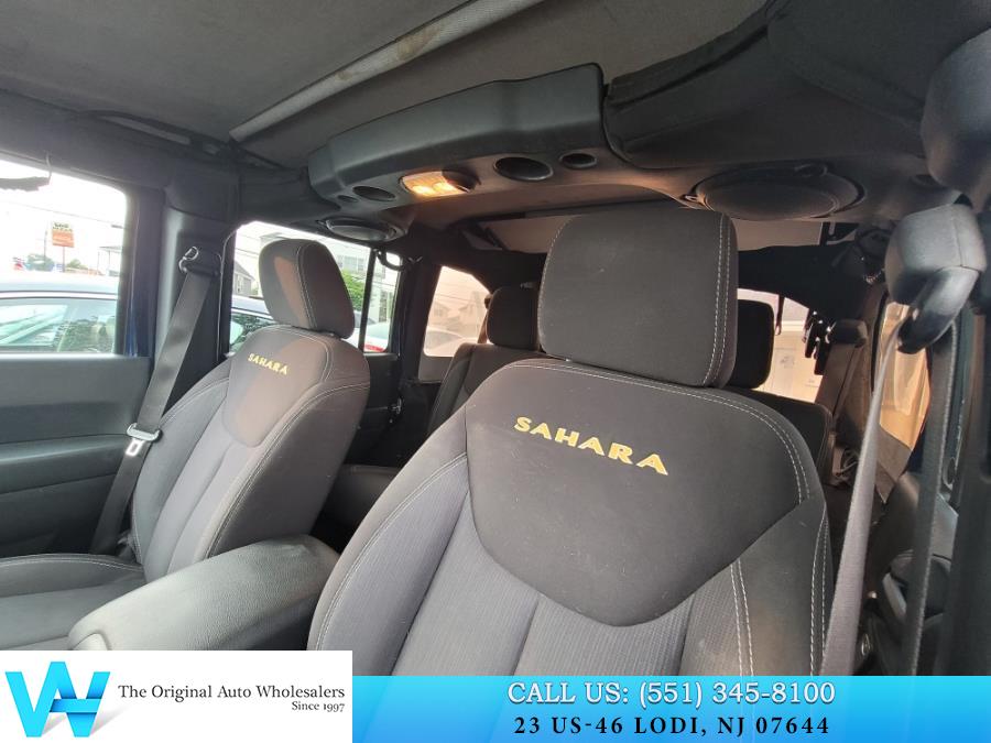 2013 Jeep Wrangler Unlimited 4WD 4dr Sahara, available for sale in Lodi, New Jersey | AW Auto & Truck Wholesalers, Inc. Lodi, New Jersey 2013 Jeep Wrangler Unlimited 4WD 4dr Sahara, available for sale in Lodi, New Jersey | AW Auto & Truck Wholesalers, Inc. Lodi, New Jersey