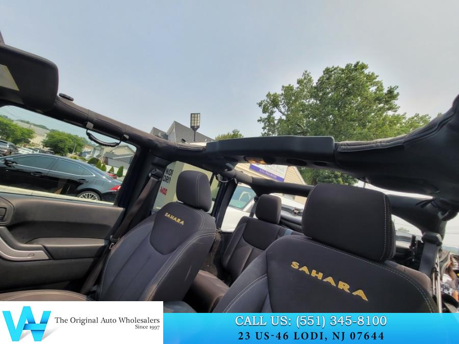 2013 Jeep Wrangler Unlimited 4WD 4dr Sahara, available for sale in Lodi, New Jersey | AW Auto & Truck Wholesalers, Inc. Lodi, New Jersey 2013 Jeep Wrangler Unlimited 4WD 4dr Sahara, available for sale in Lodi, New Jersey | AW Auto & Truck Wholesalers, Inc. Lodi, New Jersey