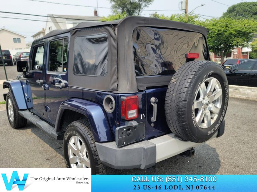 2013 Jeep Wrangler Unlimited 4WD 4dr Sahara, available for sale in Lodi, New Jersey | AW Auto & Truck Wholesalers, Inc. Lodi, New Jersey 2013 Jeep Wrangler Unlimited 4WD 4dr Sahara, available for sale in Lodi, New Jersey | AW Auto & Truck Wholesalers, Inc. Lodi, New Jersey
