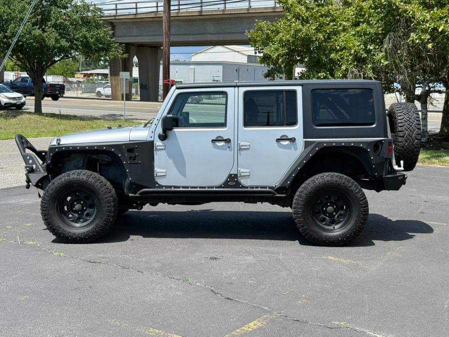 2012 Jeep Wrangler Unlimited 4WD 4dr Sport, available for sale in Lindenhurst, New York | Cargenic Automotive. Lindenhurst, New York 2012 Jeep Wrangler Unlimited 4WD 4dr Sport, available for sale in Lindenhurst, New York | Cargenic Automotive. Lindenhurst, New York