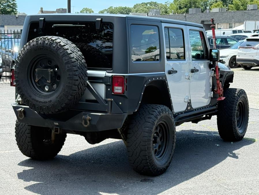 2012 Jeep Wrangler Unlimited 4WD 4dr Sport, available for sale in Lindenhurst, New York | Cargenic Automotive. Lindenhurst, New York 2012 Jeep Wrangler Unlimited 4WD 4dr Sport, available for sale in Lindenhurst, New York | Cargenic Automotive. Lindenhurst, New York
