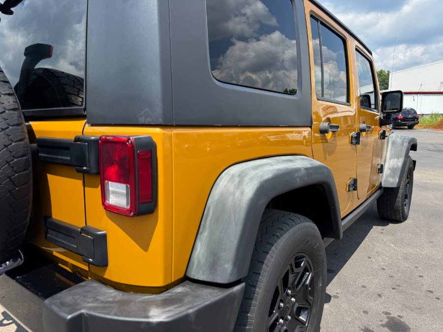 2014 Jeep Wrangler Unlimited 4WD 4dr Sport, available for sale in Ortonville, Michigan | Marsh Auto Sales LLC. Ortonville, Michigan 2014 Jeep Wrangler Unlimited 4WD 4dr Sport, available for sale in Ortonville, Michigan | Marsh Auto Sales LLC. Ortonville, Michigan