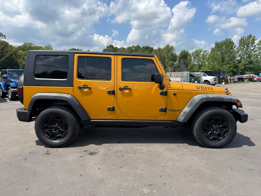 2014 Jeep Wrangler Unlimited 4WD 4dr Sport, available for sale in Ortonville, Michigan | Marsh Auto Sales LLC. Ortonville, Michigan 2014 Jeep Wrangler Unlimited 4WD 4dr Sport, available for sale in Ortonville, Michigan | Marsh Auto Sales LLC. Ortonville, Michigan