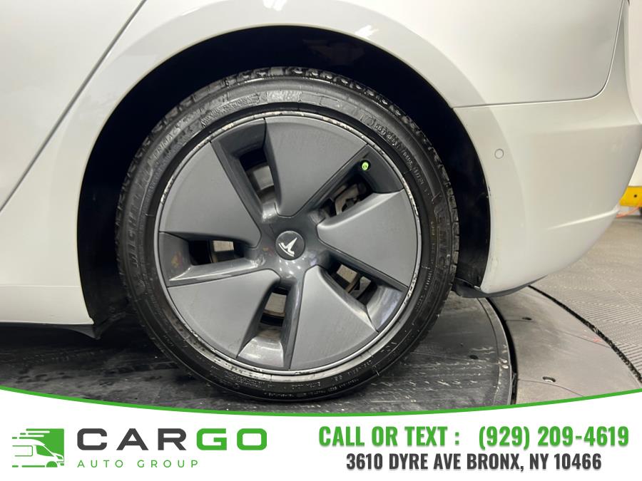 2021 Tesla Model 3 Standard Range Plus RWD, available for sale in Bronx, New York | Cargo Auto Group LLC. Bronx, New York 2021 Tesla Model 3 Standard Range Plus RWD, available for sale in Bronx, New York | Cargo Auto Group LLC. Bronx, New York