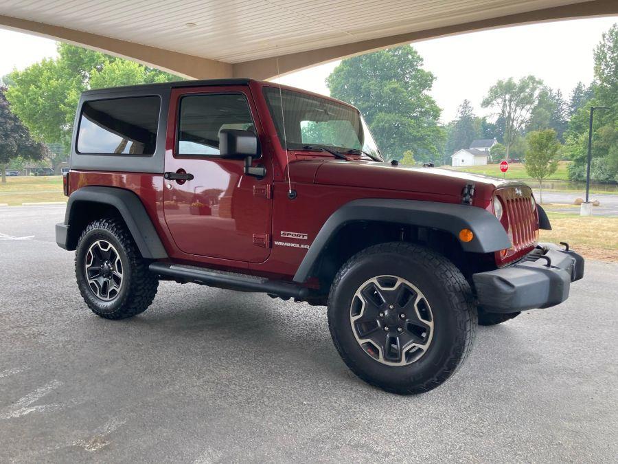 2012 Jeep Wrangler Sport SUV 2D, available for sale in Wolcott, New York | Auto Hunter CNY. Wolcott, New York 2012 Jeep Wrangler Sport SUV 2D, available for sale in Wolcott, New York | Auto Hunter CNY. Wolcott, New York