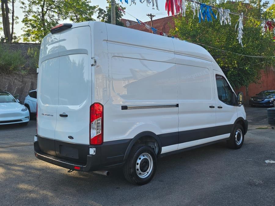 2023 Ford Transit Cargo Van T-250 148" Hi Rf 9070 GVWR RWD, available for sale in Paterson, New Jersey | Champion of Paterson. Paterson, New Jersey 2023 Ford Transit Cargo Van T-250 148" Hi Rf 9070 GVWR RWD, available for sale in Paterson, New Jersey | Champion of Paterson. Paterson, New Jersey