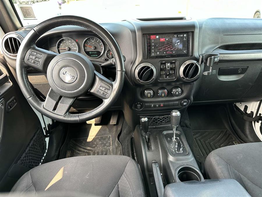 2017 Jeep Wrangler Unlimited Unlimited Sport, available for sale in Patchogue, New York | Baron Supercenter. Patchogue, New York 2017 Jeep Wrangler Unlimited Unlimited Sport, available for sale in Patchogue, New York | Baron Supercenter. Patchogue, New York