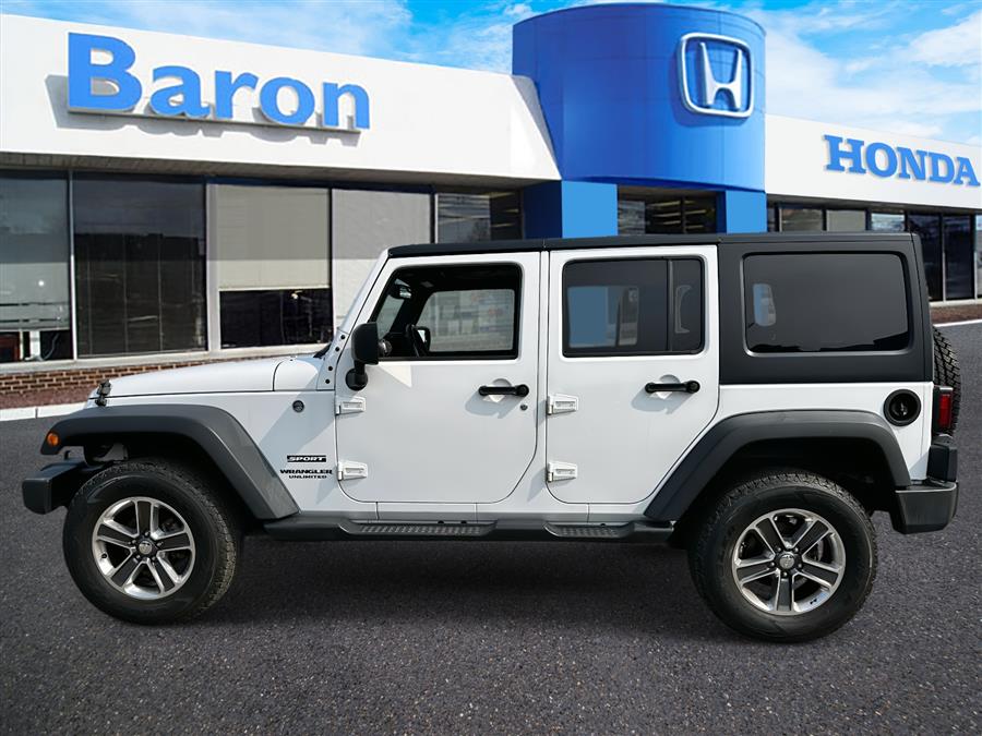 2017 Jeep Wrangler Unlimited Unlimited Sport, available for sale in Patchogue, New York | Baron Supercenter. Patchogue, New York 2017 Jeep Wrangler Unlimited Unlimited Sport, available for sale in Patchogue, New York | Baron Supercenter. Patchogue, New York