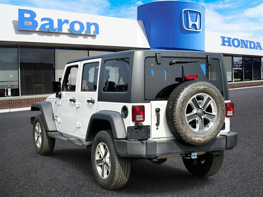 2017 Jeep Wrangler Unlimited Unlimited Sport, available for sale in Patchogue, New York | Baron Supercenter. Patchogue, New York 2017 Jeep Wrangler Unlimited Unlimited Sport, available for sale in Patchogue, New York | Baron Supercenter. Patchogue, New York