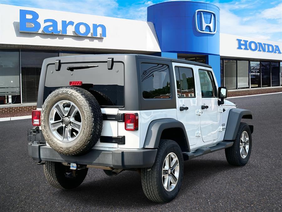 2017 Jeep Wrangler Unlimited Unlimited Sport, available for sale in Patchogue, New York | Baron Supercenter. Patchogue, New York 2017 Jeep Wrangler Unlimited Unlimited Sport, available for sale in Patchogue, New York | Baron Supercenter. Patchogue, New York