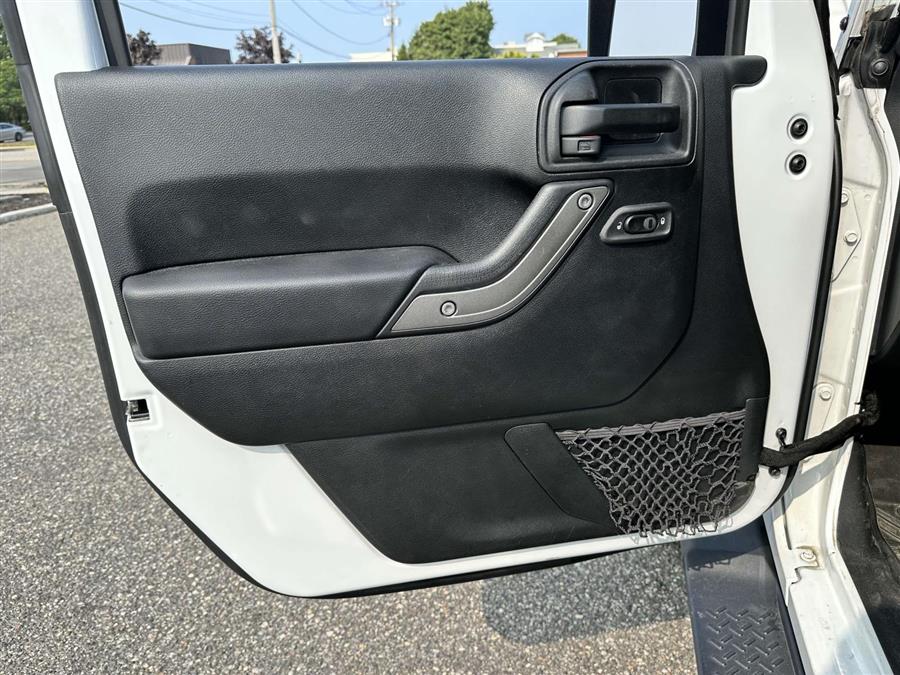 2017 Jeep Wrangler Unlimited Unlimited Sport, available for sale in Patchogue, New York | Baron Supercenter. Patchogue, New York 2017 Jeep Wrangler Unlimited Unlimited Sport, available for sale in Patchogue, New York | Baron Supercenter. Patchogue, New York