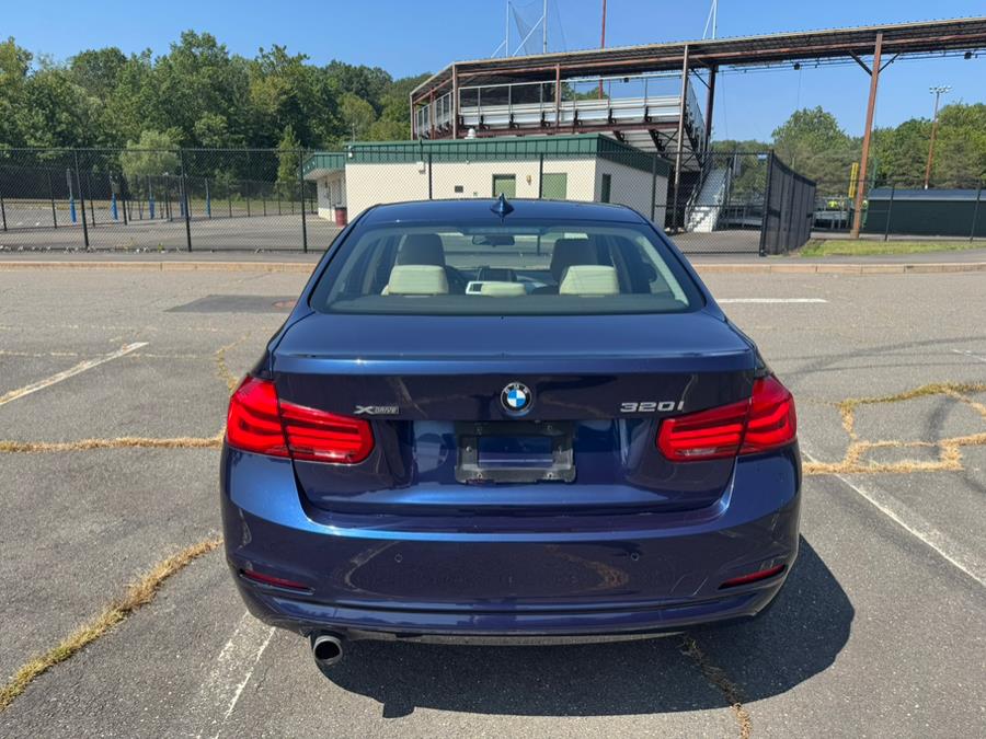 2018 BMW 3 Series 320i xDrive Sedan, available for sale in New Britain, Connecticut | Supreme Automotive. New Britain, Connecticut 2018 BMW 3 Series 320i xDrive Sedan, available for sale in New Britain, Connecticut | Supreme Automotive. New Britain, Connecticut