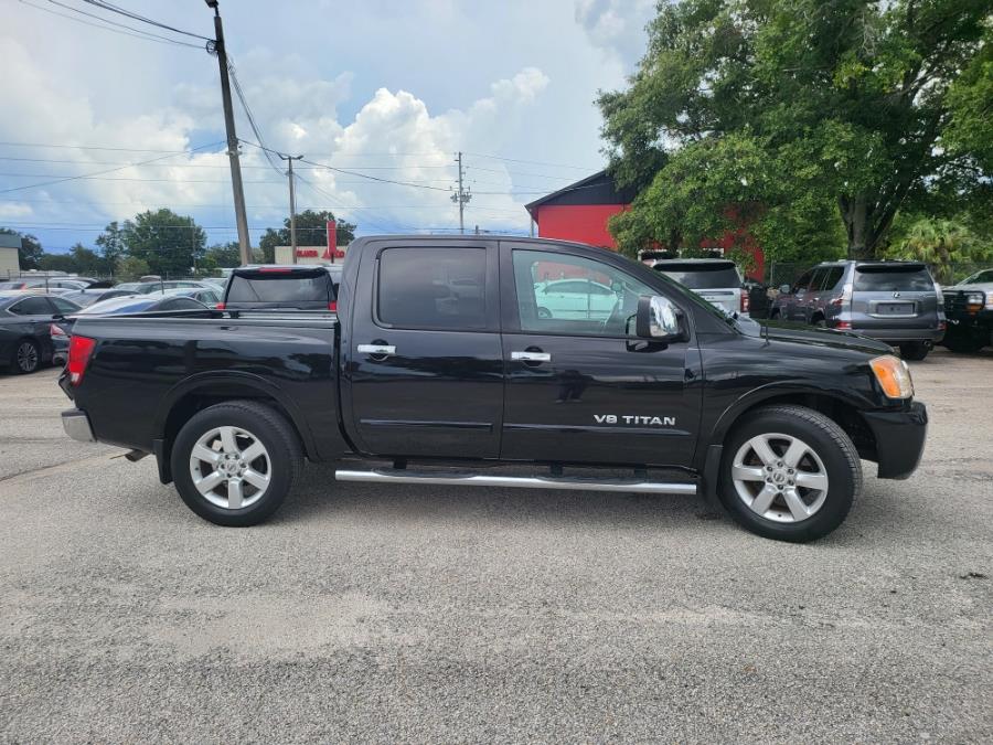 2013 Nissan Titan 2WD Crew Cab SWB SL, available for sale in Orlando, Florida | Mickeys Driver Mart. Orlando, Florida 2013 Nissan Titan 2WD Crew Cab SWB SL, available for sale in Orlando, Florida | Mickeys Driver Mart. Orlando, Florida