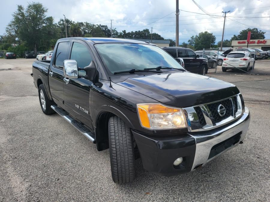 2013 Nissan Titan 2WD Crew Cab SWB SL, available for sale in Orlando, Florida | Mickeys Driver Mart. Orlando, Florida 2013 Nissan Titan 2WD Crew Cab SWB SL, available for sale in Orlando, Florida | Mickeys Driver Mart. Orlando, Florida