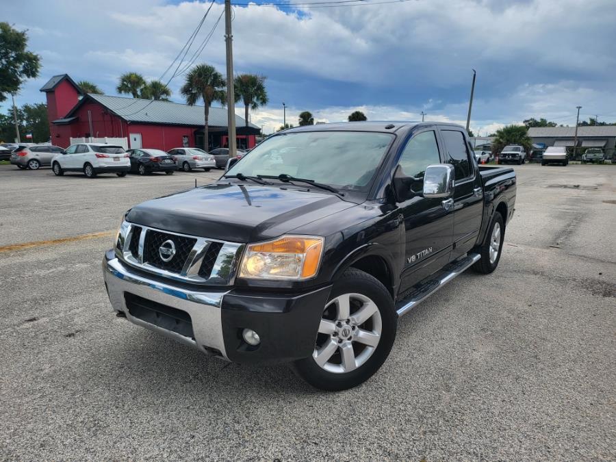 2013 Nissan Titan 2WD Crew Cab SWB SL, available for sale in Orlando, Florida | Mickeys Driver Mart. Orlando, Florida 2013 Nissan Titan 2WD Crew Cab SWB SL, available for sale in Orlando, Florida | Mickeys Driver Mart. Orlando, Florida