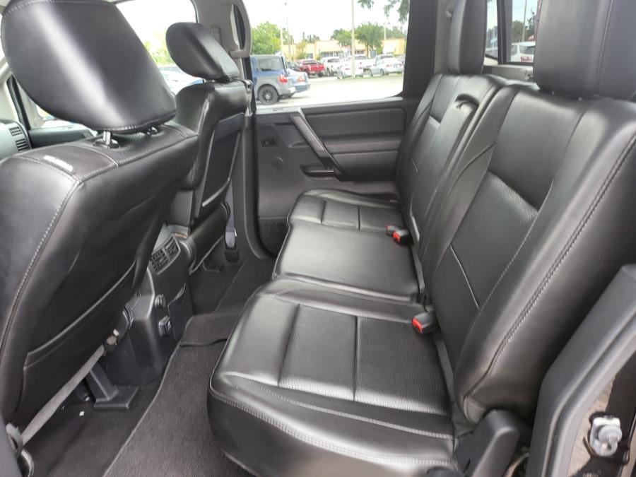 2013 Nissan Titan 2WD Crew Cab SWB SL, available for sale in Orlando, Florida | Mickeys Driver Mart. Orlando, Florida 2013 Nissan Titan 2WD Crew Cab SWB SL, available for sale in Orlando, Florida | Mickeys Driver Mart. Orlando, Florida