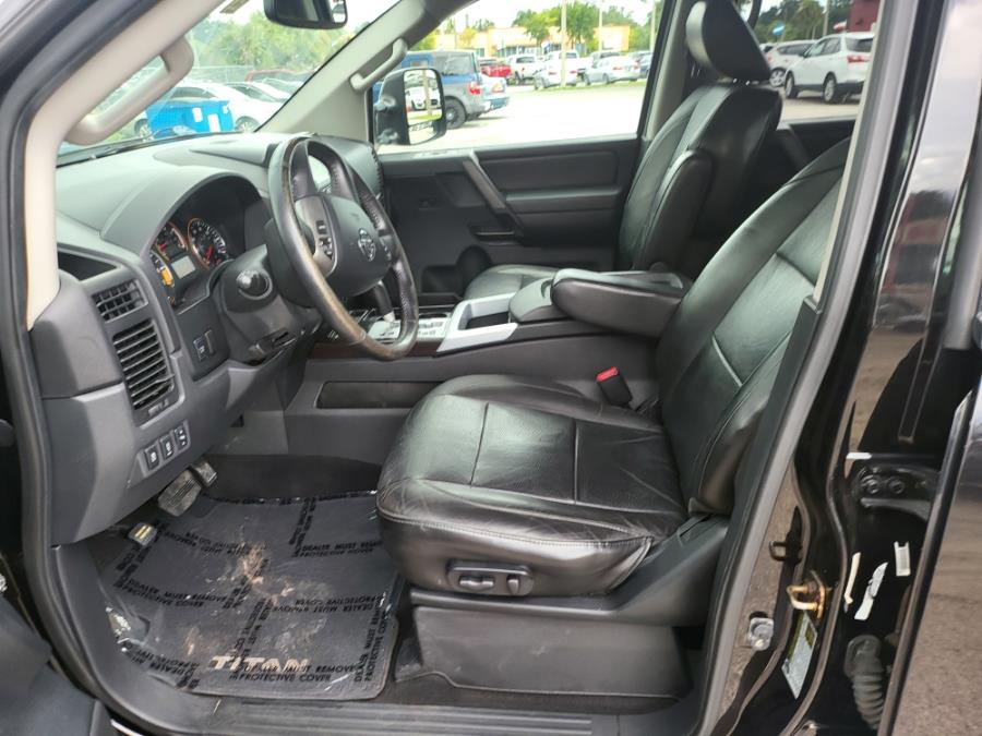 2013 Nissan Titan 2WD Crew Cab SWB SL, available for sale in Orlando, Florida | Mickeys Driver Mart. Orlando, Florida 2013 Nissan Titan 2WD Crew Cab SWB SL, available for sale in Orlando, Florida | Mickeys Driver Mart. Orlando, Florida