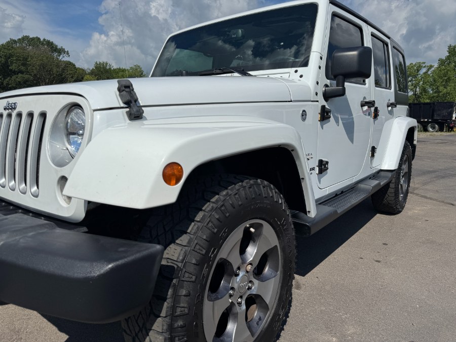 2016 Jeep Wrangler Unlimited 4WD 4dr Sahara, available for sale in Ortonville, Michigan | Marsh Auto Sales LLC. Ortonville, Michigan 2016 Jeep Wrangler Unlimited 4WD 4dr Sahara, available for sale in Ortonville, Michigan | Marsh Auto Sales LLC. Ortonville, Michigan