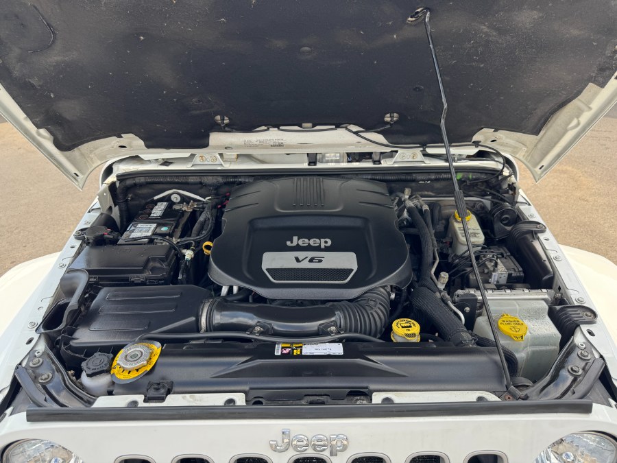 2016 Jeep Wrangler Unlimited 4WD 4dr Sahara, available for sale in Ortonville, Michigan | Marsh Auto Sales LLC. Ortonville, Michigan 2016 Jeep Wrangler Unlimited 4WD 4dr Sahara, available for sale in Ortonville, Michigan | Marsh Auto Sales LLC. Ortonville, Michigan