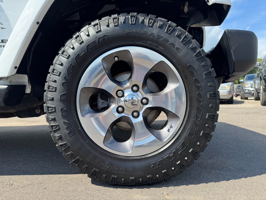 2016 Jeep Wrangler Unlimited 4WD 4dr Sahara, available for sale in Ortonville, Michigan | Marsh Auto Sales LLC. Ortonville, Michigan 2016 Jeep Wrangler Unlimited 4WD 4dr Sahara, available for sale in Ortonville, Michigan | Marsh Auto Sales LLC. Ortonville, Michigan