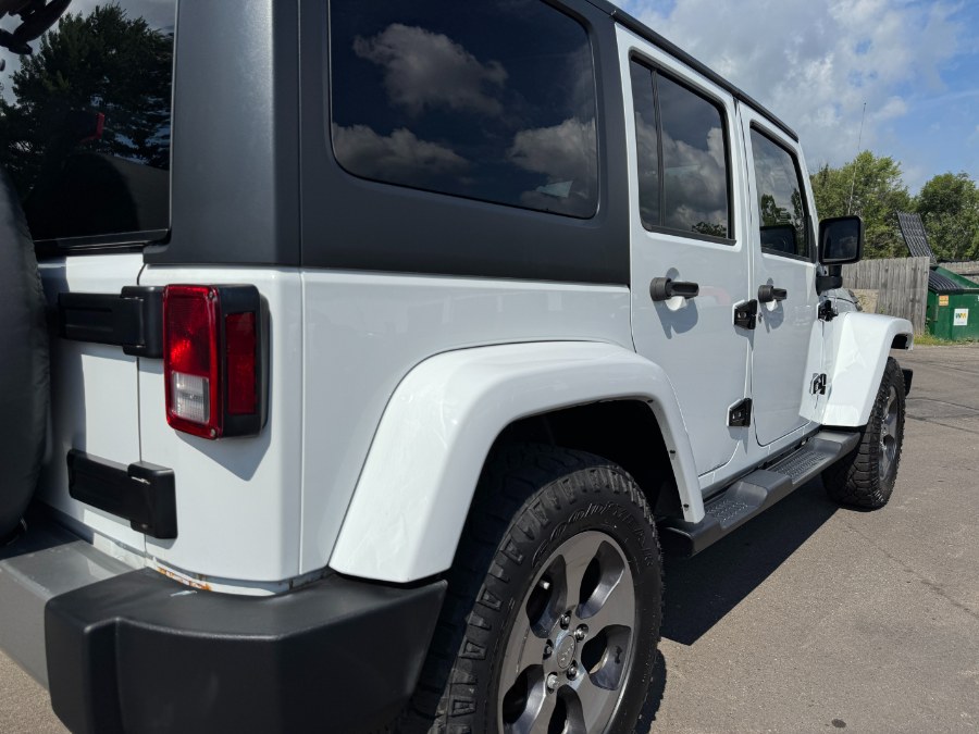 2016 Jeep Wrangler Unlimited 4WD 4dr Sahara, available for sale in Ortonville, Michigan | Marsh Auto Sales LLC. Ortonville, Michigan 2016 Jeep Wrangler Unlimited 4WD 4dr Sahara, available for sale in Ortonville, Michigan | Marsh Auto Sales LLC. Ortonville, Michigan