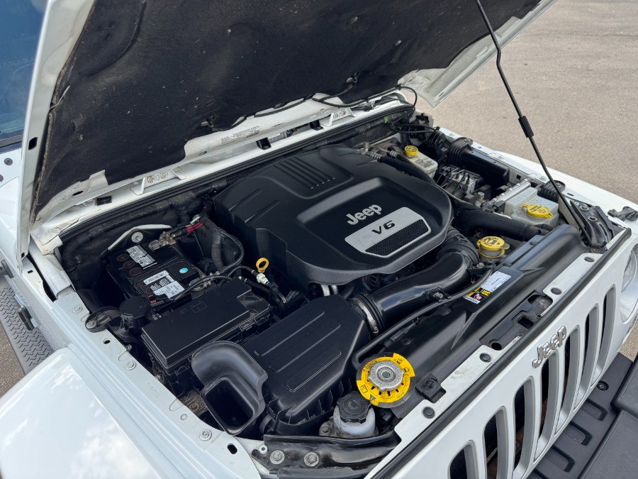 2016 Jeep Wrangler Unlimited 4WD 4dr Sahara, available for sale in Ortonville, Michigan | Marsh Auto Sales LLC. Ortonville, Michigan 2016 Jeep Wrangler Unlimited 4WD 4dr Sahara, available for sale in Ortonville, Michigan | Marsh Auto Sales LLC. Ortonville, Michigan