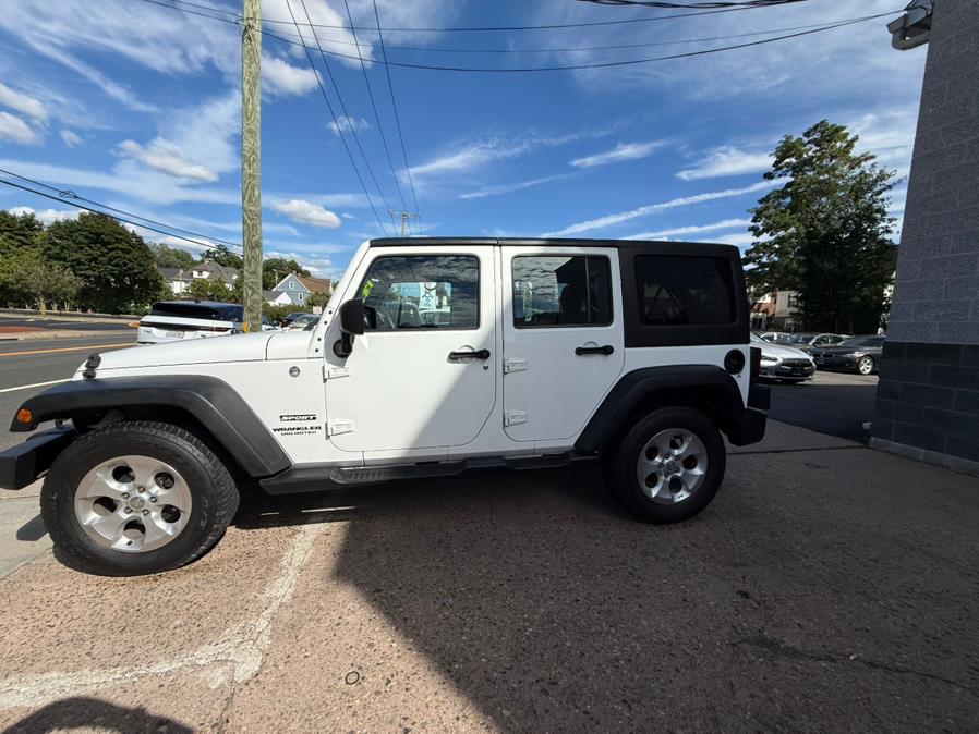 2013 Jeep Wrangler Unlimited 4WD 4dr Freedom Edition *Ltd Avail*, available for sale in Manchester, Connecticut | Carsonmain LLC. Manchester, Connecticut 2013 Jeep Wrangler Unlimited 4WD 4dr Freedom Edition *Ltd Avail*, available for sale in Manchester, Connecticut | Carsonmain LLC. Manchester, Connecticut