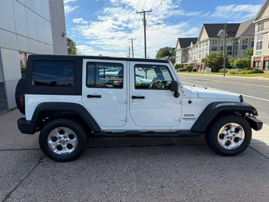 2013 Jeep Wrangler Unlimited 4WD 4dr Freedom Edition *Ltd Avail*, available for sale in Manchester, Connecticut | Carsonmain LLC. Manchester, Connecticut 2013 Jeep Wrangler Unlimited 4WD 4dr Freedom Edition *Ltd Avail*, available for sale in Manchester, Connecticut | Carsonmain LLC. Manchester, Connecticut