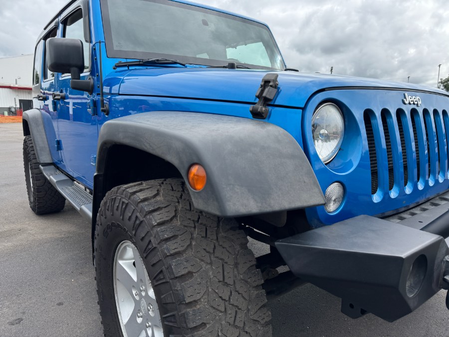 2015 Jeep Wrangler Unlimited 4WD 4dr Sport, available for sale in Ortonville, Michigan | Marsh Auto Sales LLC. Ortonville, Michigan 2015 Jeep Wrangler Unlimited 4WD 4dr Sport, available for sale in Ortonville, Michigan | Marsh Auto Sales LLC. Ortonville, Michigan