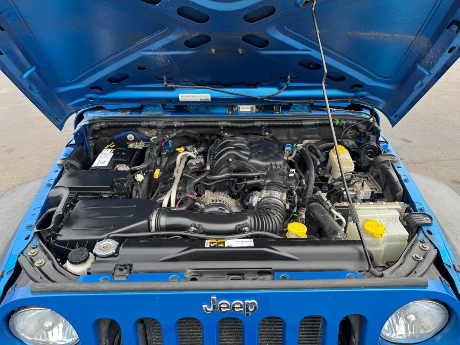 2015 Jeep Wrangler Unlimited 4WD 4dr Sport, available for sale in Ortonville, Michigan | Marsh Auto Sales LLC. Ortonville, Michigan 2015 Jeep Wrangler Unlimited 4WD 4dr Sport, available for sale in Ortonville, Michigan | Marsh Auto Sales LLC. Ortonville, Michigan