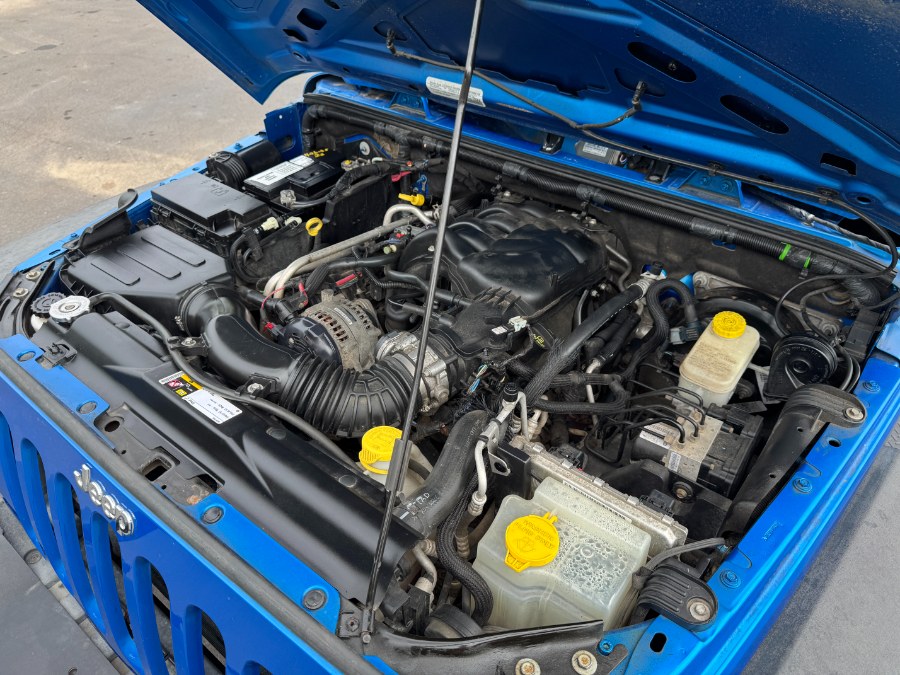 2015 Jeep Wrangler Unlimited 4WD 4dr Sport, available for sale in Ortonville, Michigan | Marsh Auto Sales LLC. Ortonville, Michigan 2015 Jeep Wrangler Unlimited 4WD 4dr Sport, available for sale in Ortonville, Michigan | Marsh Auto Sales LLC. Ortonville, Michigan