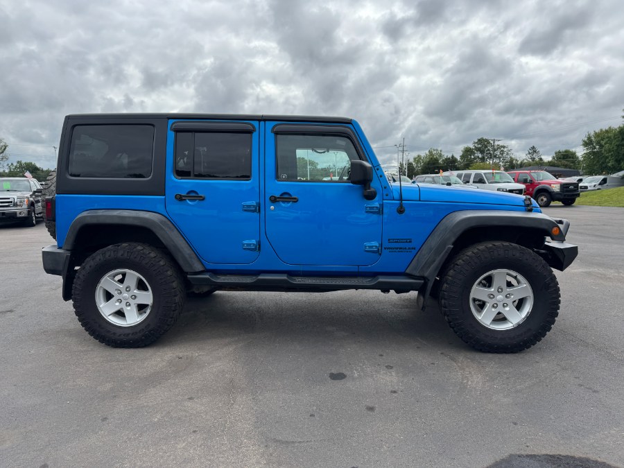 2015 Jeep Wrangler Unlimited 4WD 4dr Sport, available for sale in Ortonville, Michigan | Marsh Auto Sales LLC. Ortonville, Michigan 2015 Jeep Wrangler Unlimited 4WD 4dr Sport, available for sale in Ortonville, Michigan | Marsh Auto Sales LLC. Ortonville, Michigan