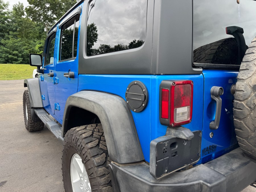 2015 Jeep Wrangler Unlimited 4WD 4dr Sport, available for sale in Ortonville, Michigan | Marsh Auto Sales LLC. Ortonville, Michigan 2015 Jeep Wrangler Unlimited 4WD 4dr Sport, available for sale in Ortonville, Michigan | Marsh Auto Sales LLC. Ortonville, Michigan