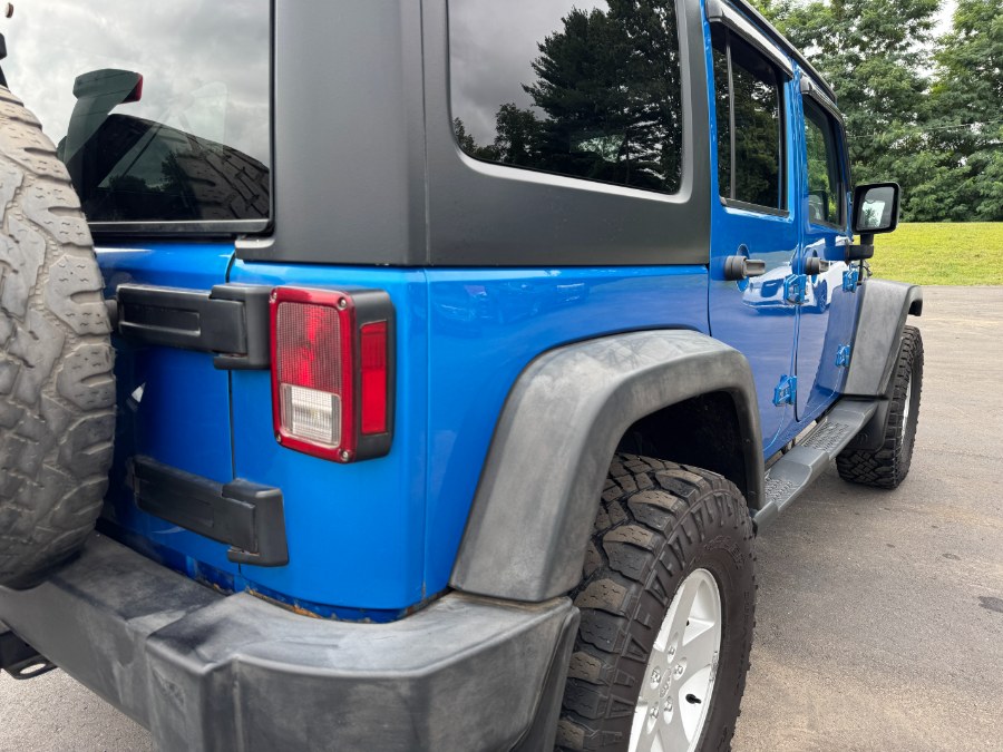 2015 Jeep Wrangler Unlimited 4WD 4dr Sport, available for sale in Ortonville, Michigan | Marsh Auto Sales LLC. Ortonville, Michigan 2015 Jeep Wrangler Unlimited 4WD 4dr Sport, available for sale in Ortonville, Michigan | Marsh Auto Sales LLC. Ortonville, Michigan