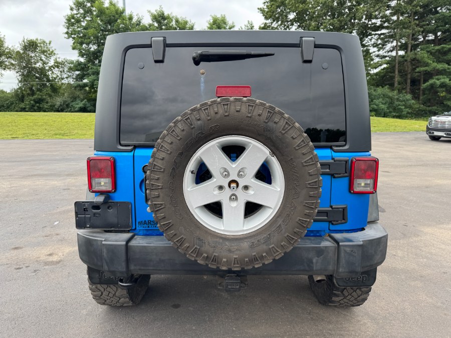 2015 Jeep Wrangler Unlimited 4WD 4dr Sport, available for sale in Ortonville, Michigan | Marsh Auto Sales LLC. Ortonville, Michigan 2015 Jeep Wrangler Unlimited 4WD 4dr Sport, available for sale in Ortonville, Michigan | Marsh Auto Sales LLC. Ortonville, Michigan