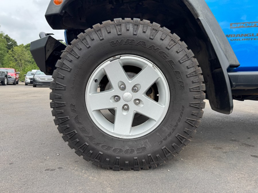 2015 Jeep Wrangler Unlimited 4WD 4dr Sport, available for sale in Ortonville, Michigan | Marsh Auto Sales LLC. Ortonville, Michigan 2015 Jeep Wrangler Unlimited 4WD 4dr Sport, available for sale in Ortonville, Michigan | Marsh Auto Sales LLC. Ortonville, Michigan