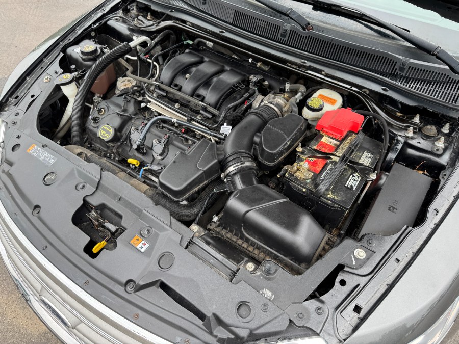 2015 Ford Taurus 4dr Sdn SEL FWD, available for sale in Ortonville, Michigan | Marsh Auto Sales LLC. Ortonville, Michigan 2015 Ford Taurus 4dr Sdn SEL FWD, available for sale in Ortonville, Michigan | Marsh Auto Sales LLC. Ortonville, Michigan