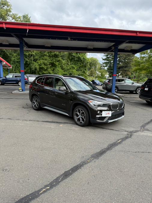 2018 BMW X1 xDrive28i Sports Activity Vehicle, available for sale in Windsor Locks, Connecticut | JANNA MOTORS LLC. Windsor Locks, Connecticut 2018 BMW X1 xDrive28i Sports Activity Vehicle, available for sale in Windsor Locks, Connecticut | JANNA MOTORS LLC. Windsor Locks, Connecticut