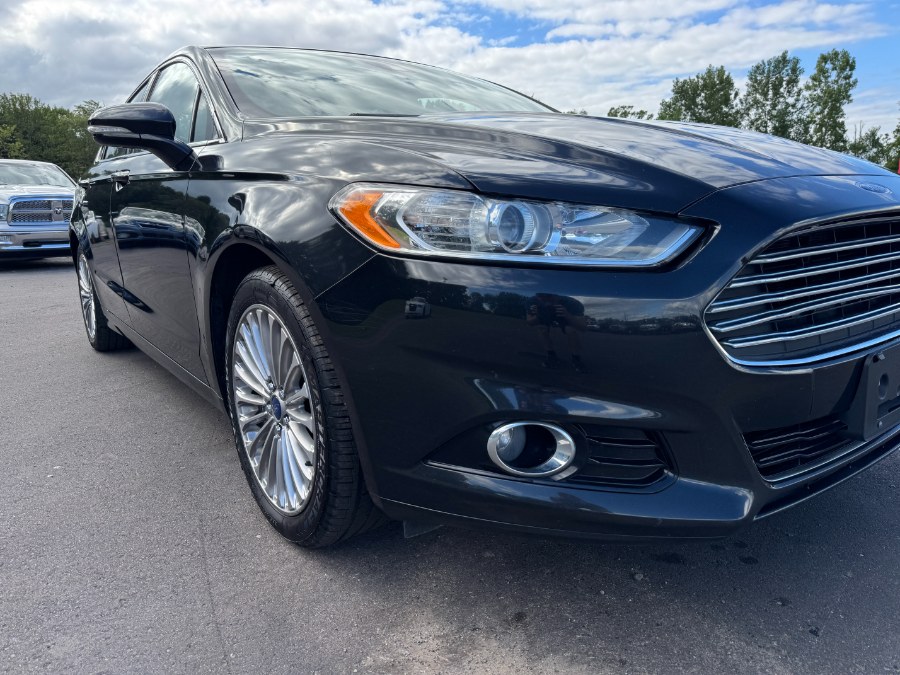 2014 Ford Fusion 4dr Sdn Titanium AWD, available for sale in Ortonville, Michigan | Marsh Auto Sales LLC. Ortonville, Michigan 2014 Ford Fusion 4dr Sdn Titanium AWD, available for sale in Ortonville, Michigan | Marsh Auto Sales LLC. Ortonville, Michigan