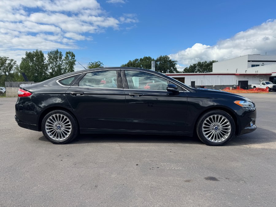 2014 Ford Fusion 4dr Sdn Titanium AWD, available for sale in Ortonville, Michigan | Marsh Auto Sales LLC. Ortonville, Michigan 2014 Ford Fusion 4dr Sdn Titanium AWD, available for sale in Ortonville, Michigan | Marsh Auto Sales LLC. Ortonville, Michigan