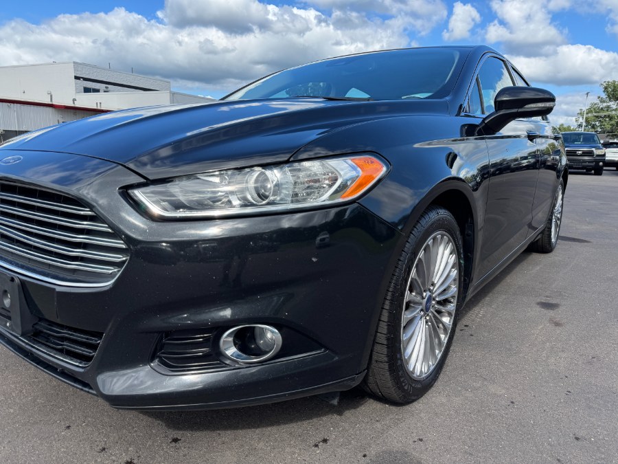 2014 Ford Fusion 4dr Sdn Titanium AWD, available for sale in Ortonville, Michigan | Marsh Auto Sales LLC. Ortonville, Michigan 2014 Ford Fusion 4dr Sdn Titanium AWD, available for sale in Ortonville, Michigan | Marsh Auto Sales LLC. Ortonville, Michigan