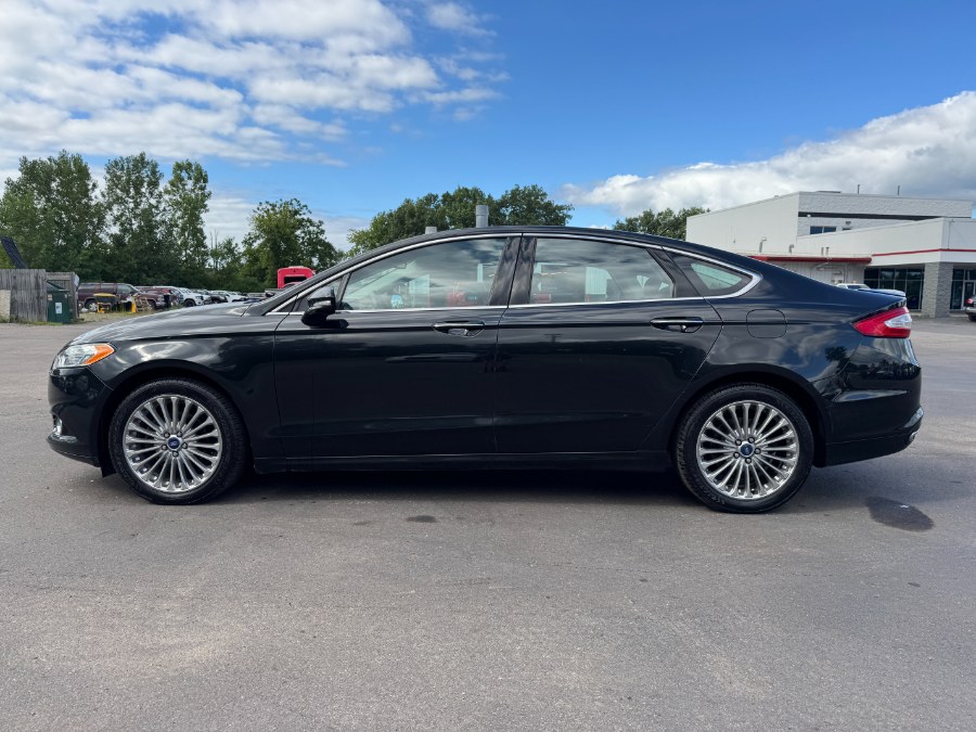 2014 Ford Fusion 4dr Sdn Titanium AWD, available for sale in Ortonville, Michigan | Marsh Auto Sales LLC. Ortonville, Michigan 2014 Ford Fusion 4dr Sdn Titanium AWD, available for sale in Ortonville, Michigan | Marsh Auto Sales LLC. Ortonville, Michigan
