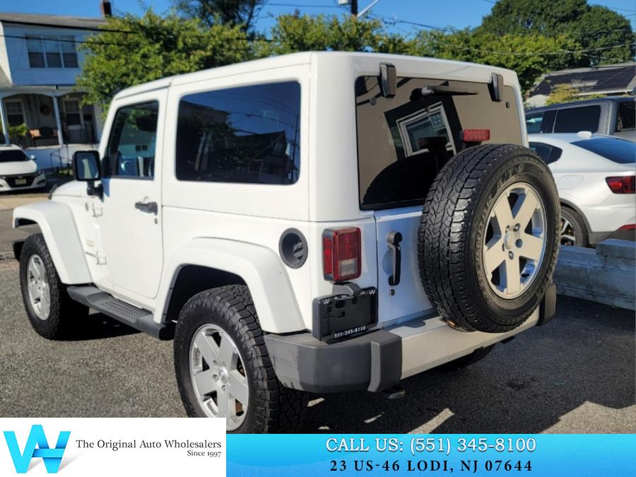 2011 Jeep Wrangler 4WD 2dr Sahara, available for sale in Lodi, New Jersey | AW Auto & Truck Wholesalers, Inc. Lodi, New Jersey 2011 Jeep Wrangler 4WD 2dr Sahara, available for sale in Lodi, New Jersey | AW Auto & Truck Wholesalers, Inc. Lodi, New Jersey