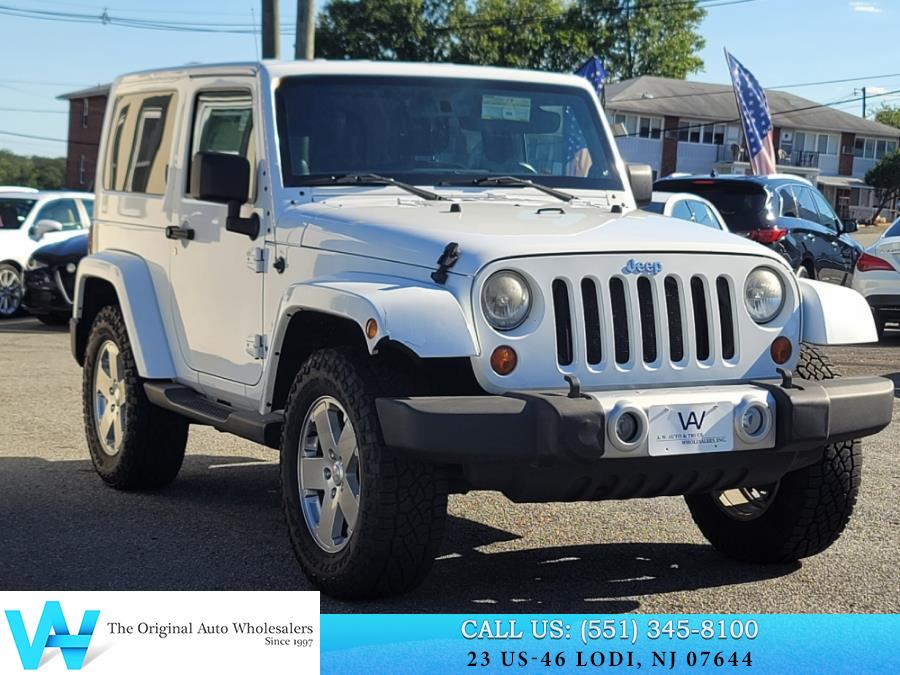 2011 Jeep Wrangler 4WD 2dr Sahara, available for sale in Lodi, New Jersey | AW Auto & Truck Wholesalers, Inc. Lodi, New Jersey 2011 Jeep Wrangler 4WD 2dr Sahara, available for sale in Lodi, New Jersey | AW Auto & Truck Wholesalers, Inc. Lodi, New Jersey