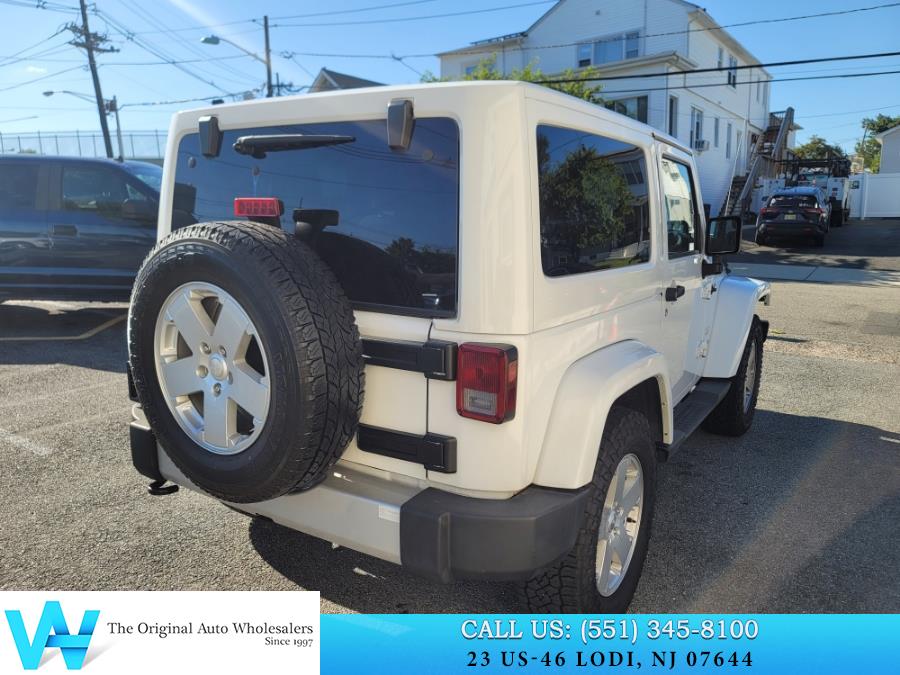 2011 Jeep Wrangler 4WD 2dr Sahara, available for sale in Lodi, New Jersey | AW Auto & Truck Wholesalers, Inc. Lodi, New Jersey 2011 Jeep Wrangler 4WD 2dr Sahara, available for sale in Lodi, New Jersey | AW Auto & Truck Wholesalers, Inc. Lodi, New Jersey