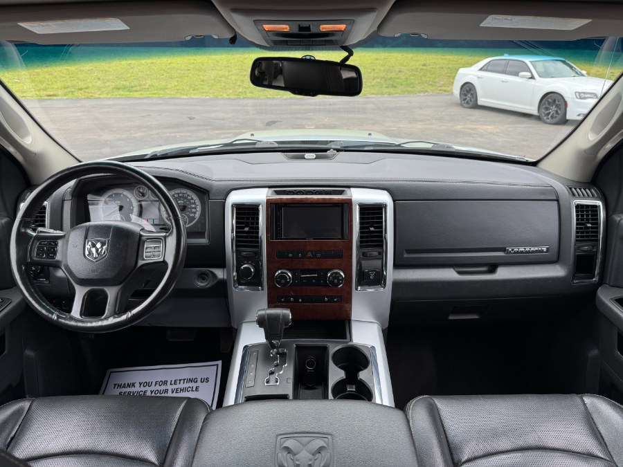 2012 Ram 1500 4WD Quad Cab 140.5" Laramie, available for sale in Ortonville, Michigan | Marsh Auto Sales LLC. Ortonville, Michigan 2012 Ram 1500 4WD Quad Cab 140.5" Laramie, available for sale in Ortonville, Michigan | Marsh Auto Sales LLC. Ortonville, Michigan