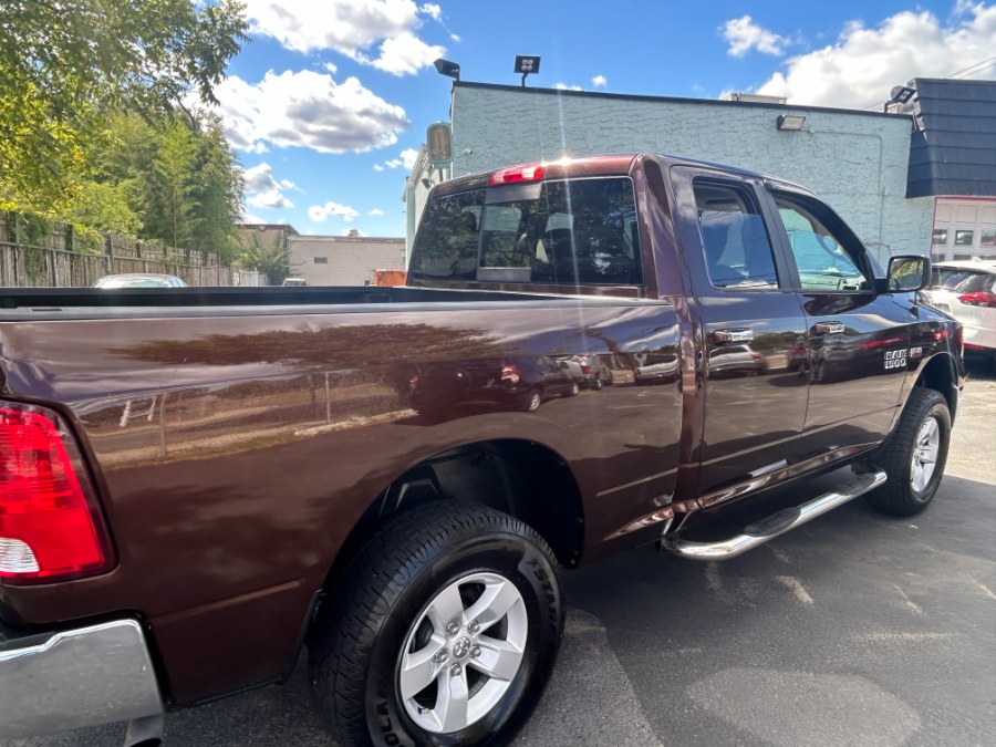 2014 Ram 1500 4WD Quad Cab 140.5" SLT, available for sale in West Babylon, New York | New Gen Auto Group. West Babylon, New York 2014 Ram 1500 4WD Quad Cab 140.5" SLT, available for sale in West Babylon, New York | New Gen Auto Group. West Babylon, New York