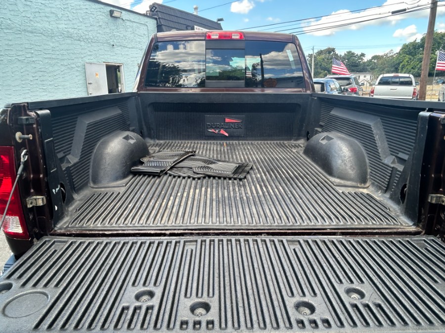 2014 Ram 1500 4WD Quad Cab 140.5" SLT, available for sale in West Babylon, New York | New Gen Auto Group. West Babylon, New York 2014 Ram 1500 4WD Quad Cab 140.5" SLT, available for sale in West Babylon, New York | New Gen Auto Group. West Babylon, New York
